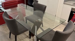 Nick Scali Glass table top dining set with four chairs