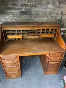 Antique Cutler Oak Roll Top Desk.