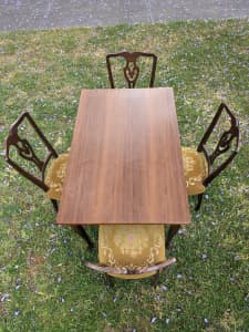 Dining wooden table. With 4 velvet covered chairs.