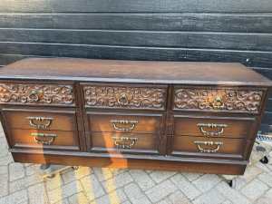Old timber and veneer cabinet with 9 drawers