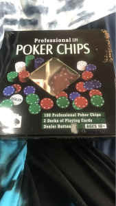 Poker chips dealer button deck of cards