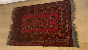 Hand knotted authentic rug (damaged)
