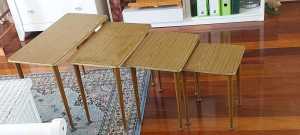 Vintage, Mid Century nest of 4 tables. In excellent condition 