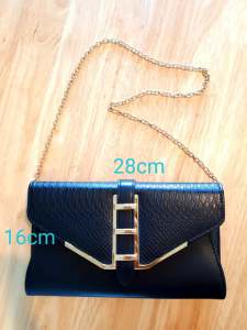 Aldo black clutch bag with detachable gold strap, excellent condition
