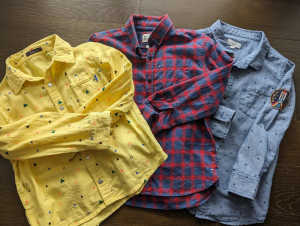 Four long sleeve tops -size 7-8 (used in good condition)