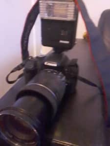 Canon Eos camera with charger