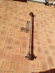 Trailer axle with mounting hardware