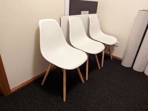 Three White Chairs