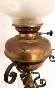 oil lamp on on brass stand 