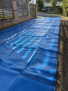 Swimming pool blanket 10m long by 4.9m wide.