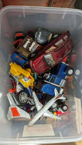 Box of toy vehicles - cars, trucks, planes 