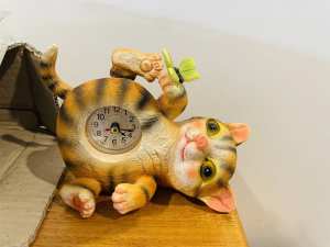 Cat clock, rail and right back foot moves, brand new out of box