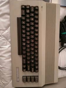 Commodore 64 &1541 drive plus power supply 2 books, 10 disks & Cables