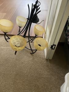 Pendant light with 5 Amber glass fixtures in excellent condition. 