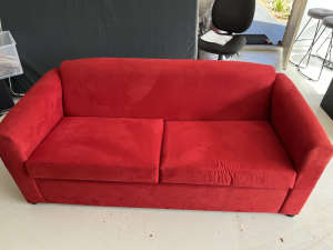 Bright red futon bed lounge chair