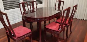 Rosewood dining table and chairs