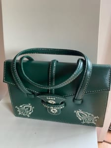 Green handmade leather handbag