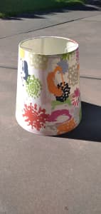 Colourful Lampshade.
30cm long, 23cm wide top, 33cm wide base.
Pickup 