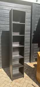 Tall narrow dark brown bookcase with 6 shelves