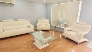 Leather lounge 3 seater and 2 chairs( cream)