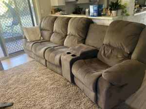 4 seater couch with deep chest, cup holders and 2 reclining seats