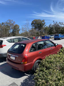 2000 Ford Laser Lxi 4 Sp Automatic 5d Hatchback