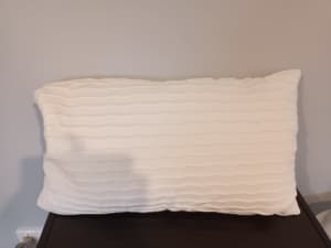 White ripped cushion