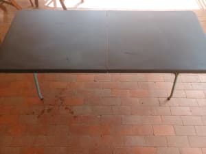 Folding Trestle Table w/ Durable Plastic Top - Good working condition