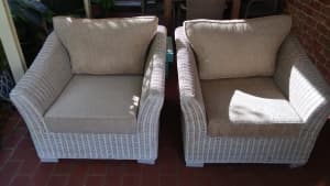 2 Genuine cane indoor/outdoor lounge chairs.