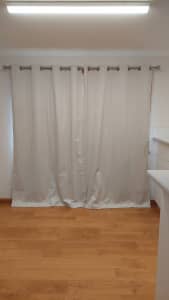 Eyelet Curtains x6 with rods and brackets.