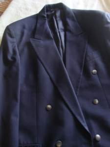 Mans classic double-breasted blue blazer with bone buttons