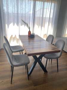 Beautiful solid wood dining table with velvet chairs