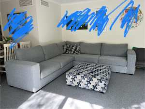 Large L shaped couch with ottoman