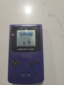 Purple gameboy colour with 3 games