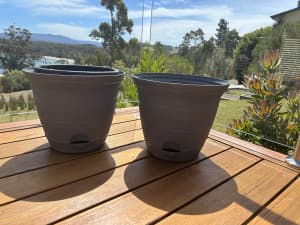 2x grey self-watering plant pots