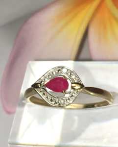 W/E SALE 9k Solid gold 0.68ct Natural Ruby and Diamond halo ring