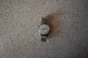 Omega watch with valuation papers 