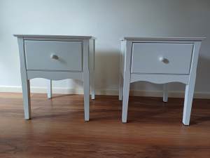 two white bedside chest of drawers