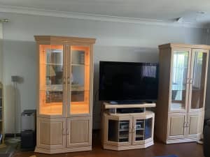 Display cupboards with entertainment unit.