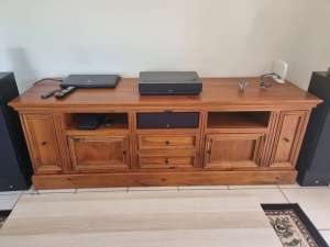 Solid wood entertainment cabinet.