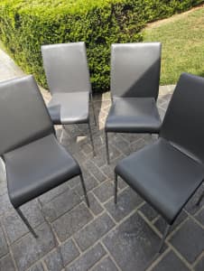 Dinning chairs grey leather style (4) the lot $5