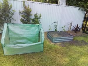 Raised garden beds with covers