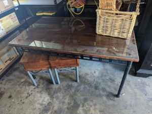 Dining table with separate glass pane