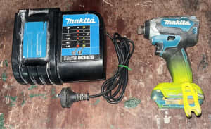 Makita impact drill and charger