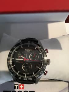 Tissot sports watch ,comes with box and all bookers
