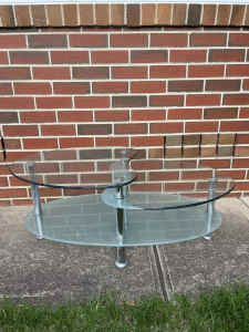Coffee Table - glass top, silver legs.