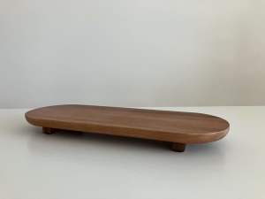 Solid raised wooden serving board
