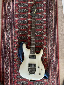 Ibanez electric guitar and case. Joe Satriani Series.