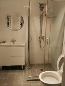 A room with a separate bathroom outside . The location is at Padstow