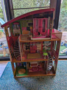 Large three story wooden doll house with furniture